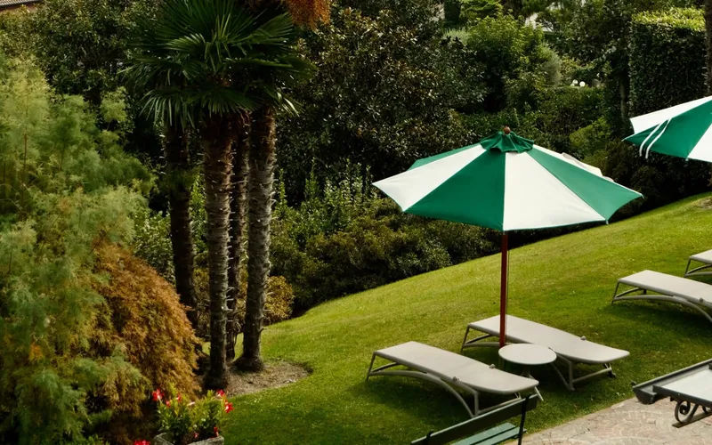 The exterior and tiered garden of Belvedere Bellagio, a Lake Como hotel