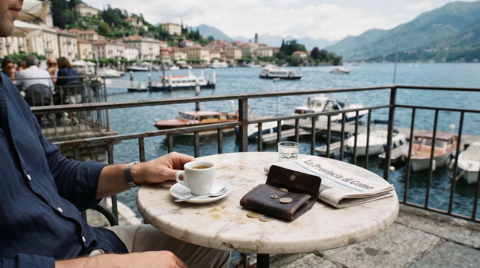 A ticket window and the pier queue at an imbarcadero on a bright morning, where most of what Lake Como costs is actually paid